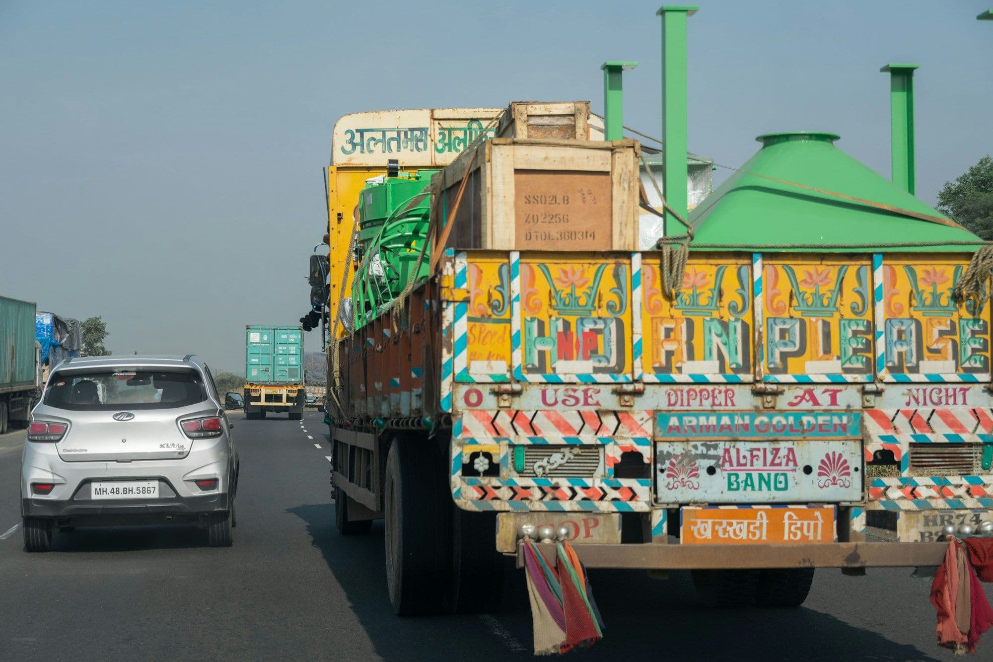 Colourfully painted Indian goods truck on a highway